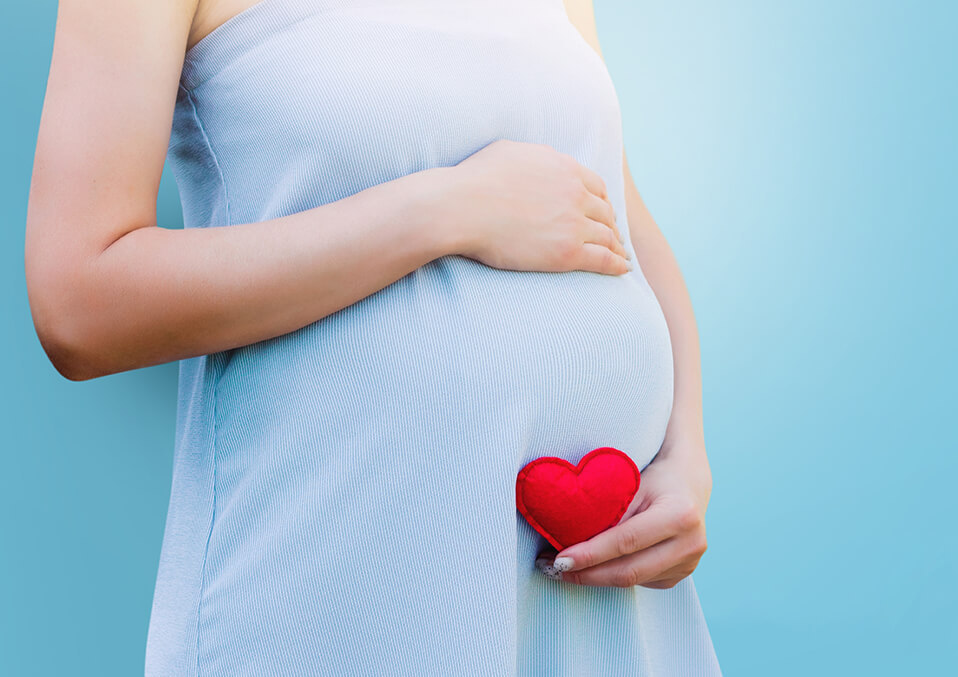 fat pregnant woman surrounded by hearts 2