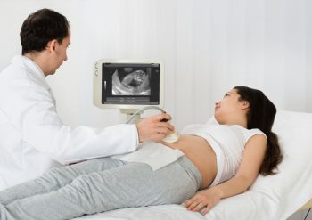 how long does implantation bleeding last with twins