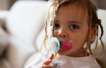 At what age does a pacifier affect teeth?