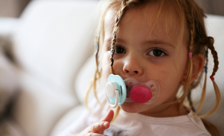 At what age does a pacifier affect teeth?