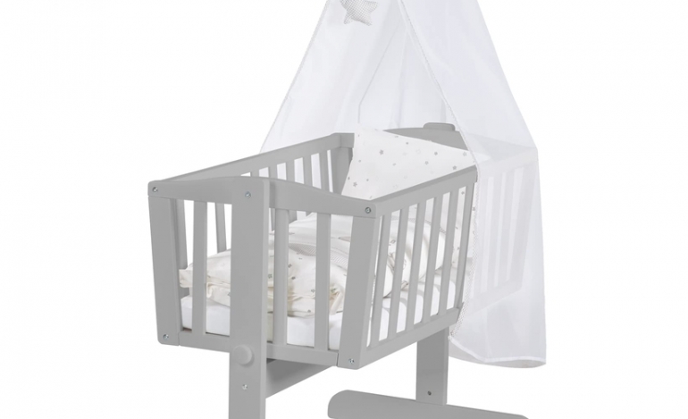 How long can a baby stay in a mini crib?